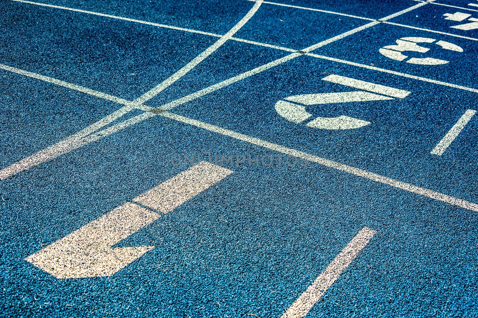 background of the start line of blue running tracks