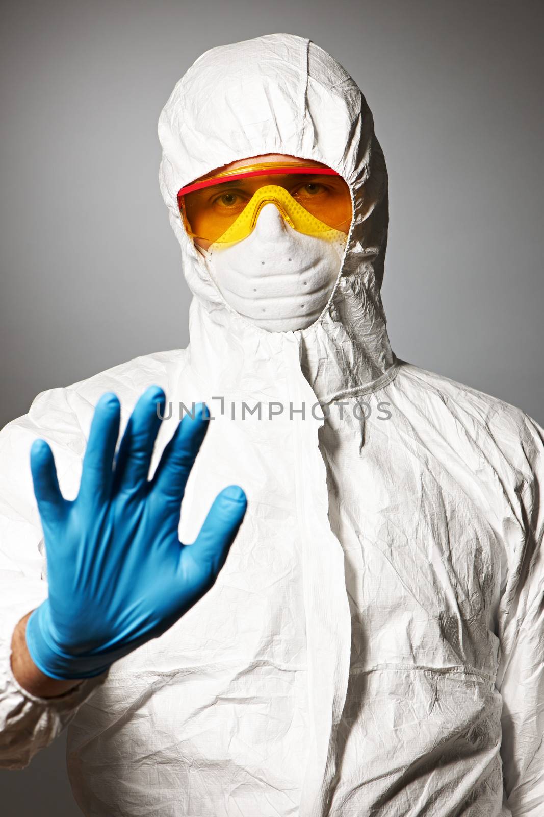 Scientist in protective wear by haveseen