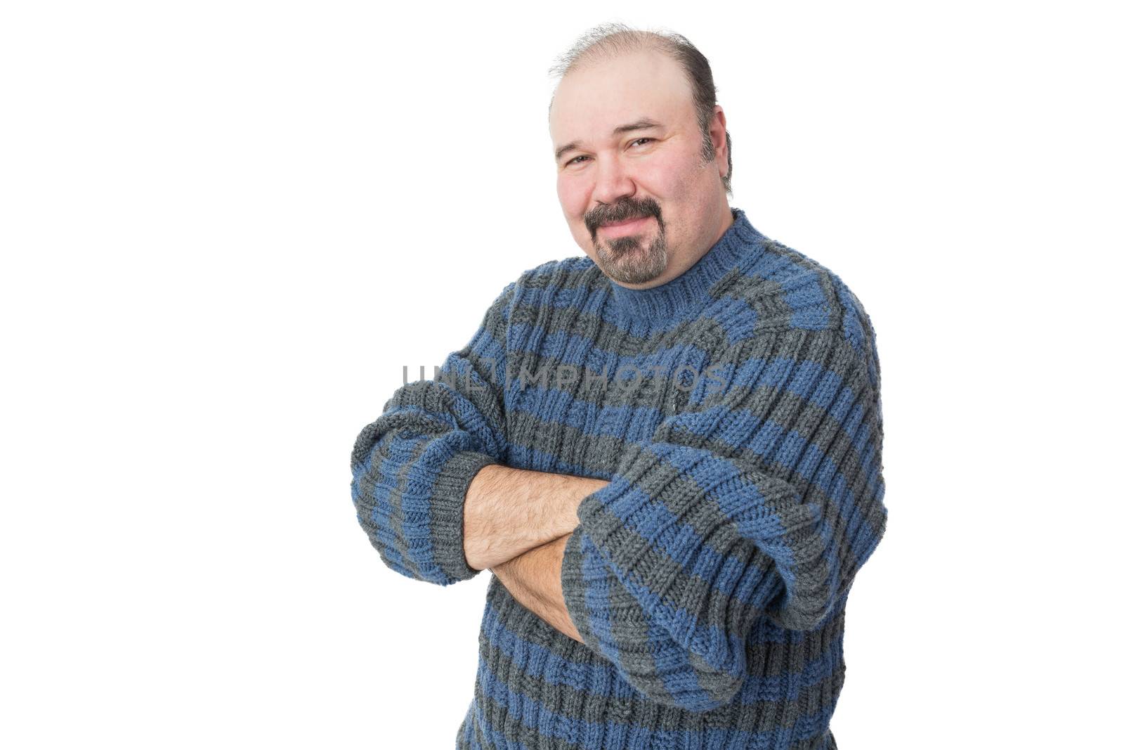 Portrait of a friendly mature man with arms crossed on a white background