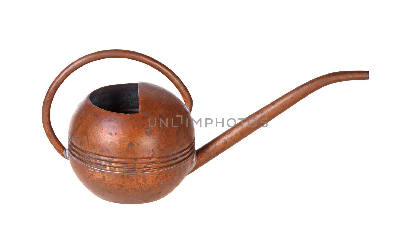 A small antique watering can made of copper metal isolated against a white background
