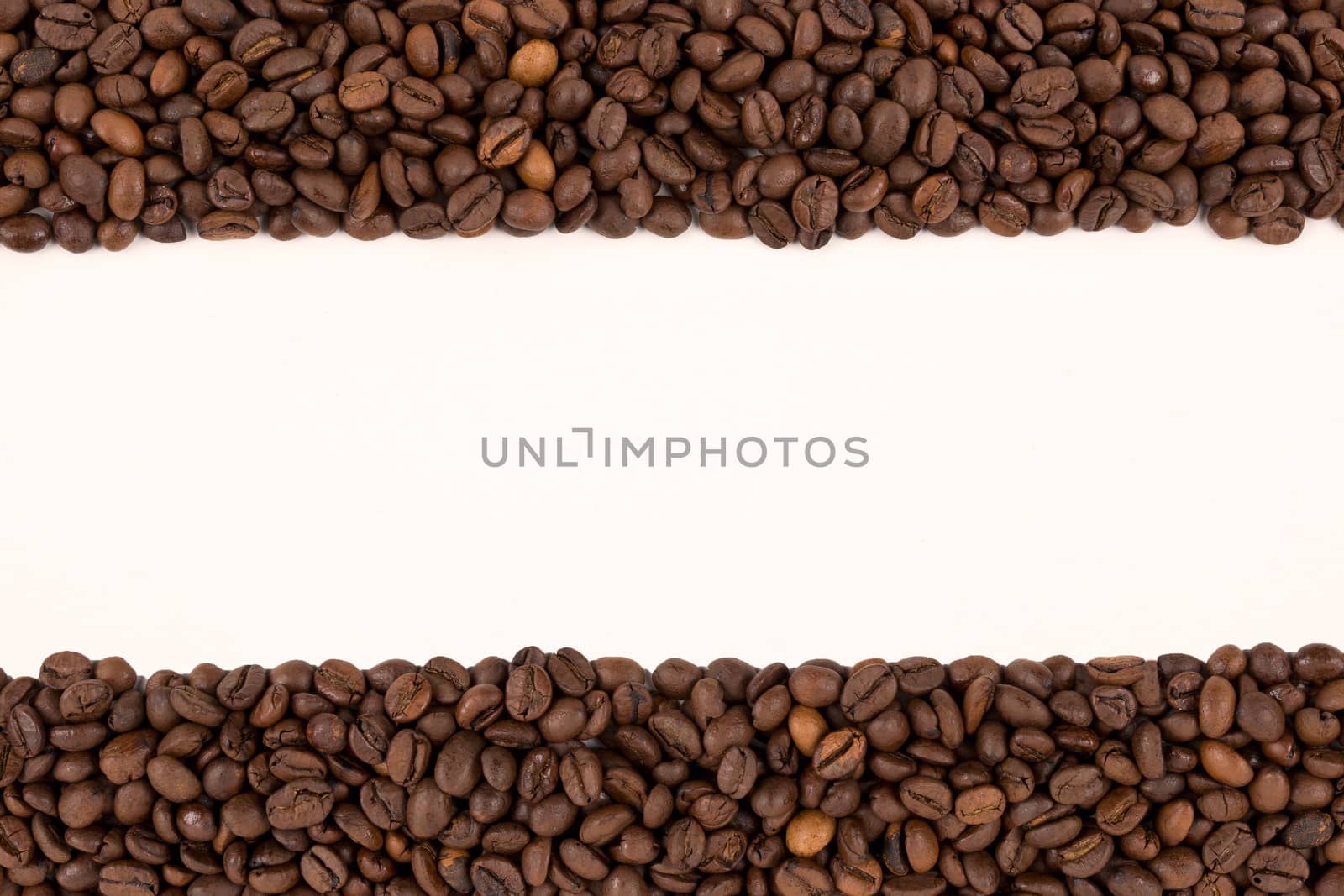 A lot of coffee beans on a white background