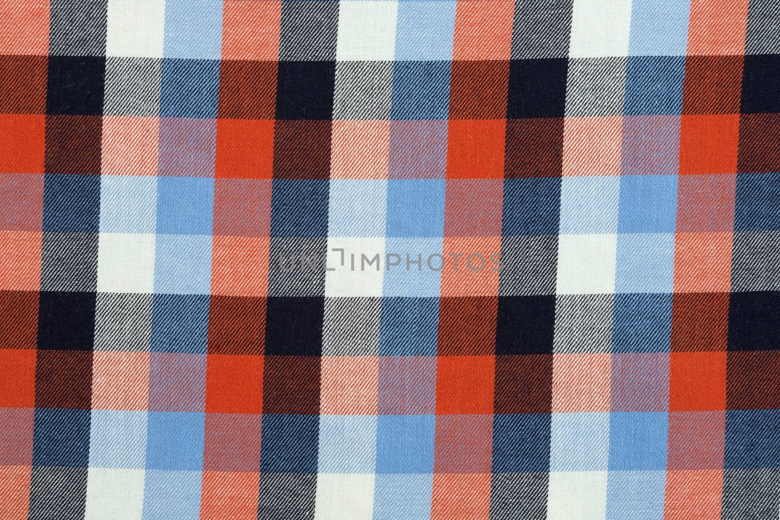 Material in a colorful plaid, a textile background.