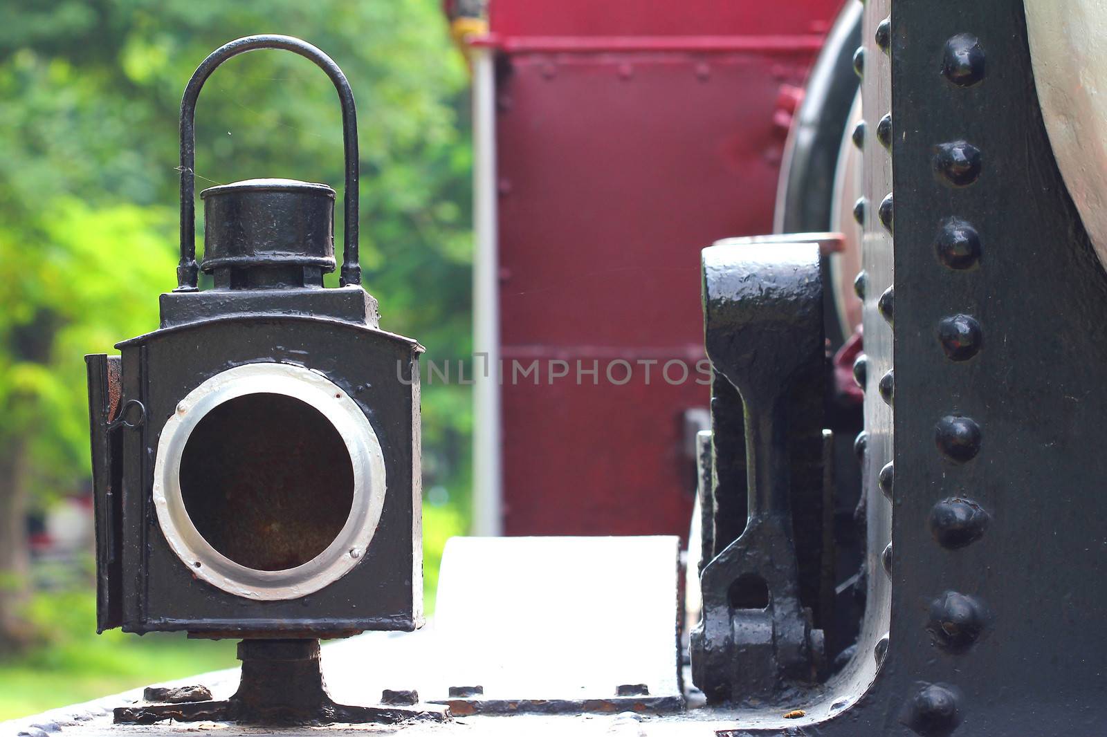 old lamp on steam engine by motionkarma