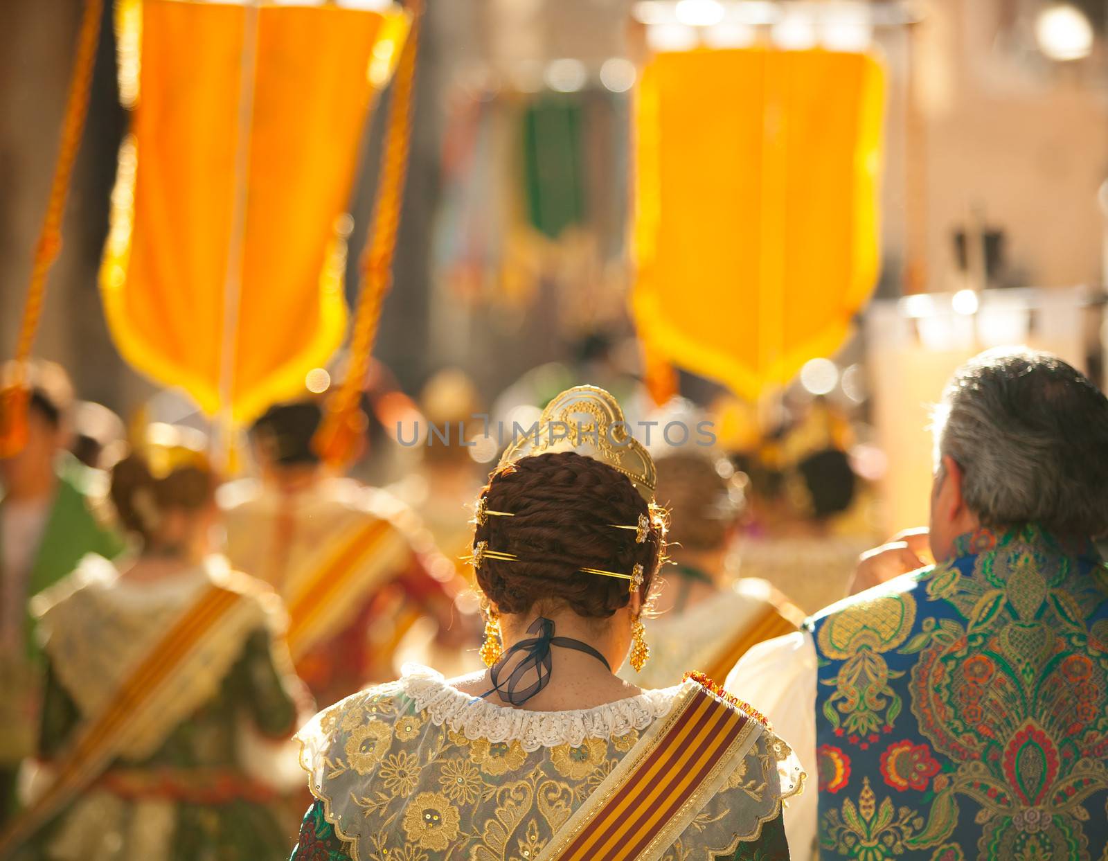 Unkown Fallero and Falleras people walking in fallas fest of Valencia