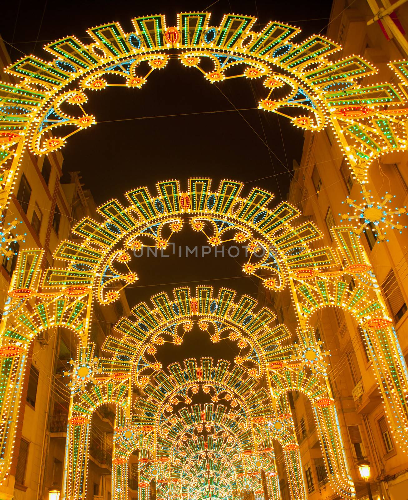 Beautiful night lights in Fallas fest of Valencia in calle Sueca street Spain