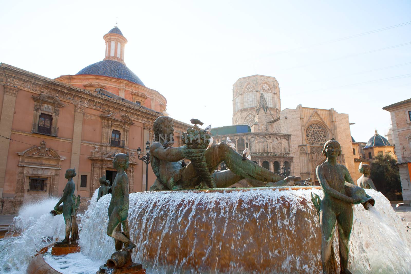 Valencia Plaza de la Virgen Neptuno foutain and Cathedral in Spain