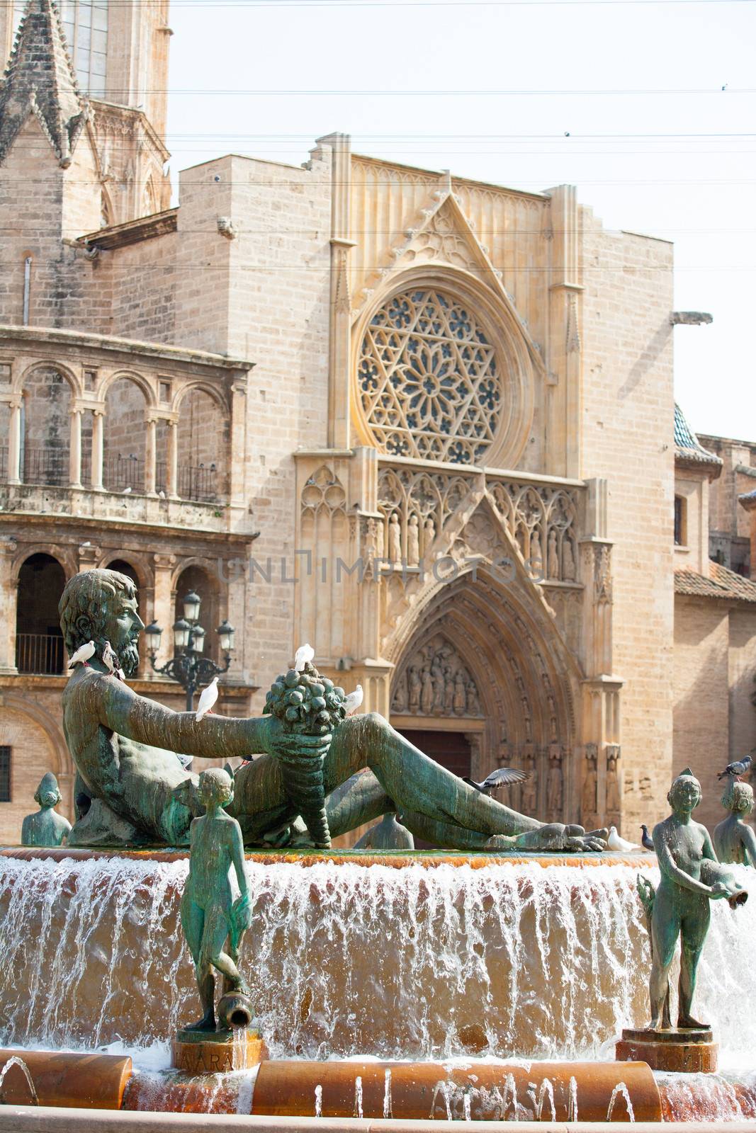Valencia Plaza de la virgen square with Neptuno fountain by lunamarina