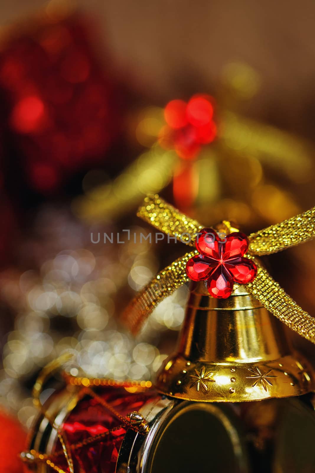 Festive Christmas golden bells photographed close-up background