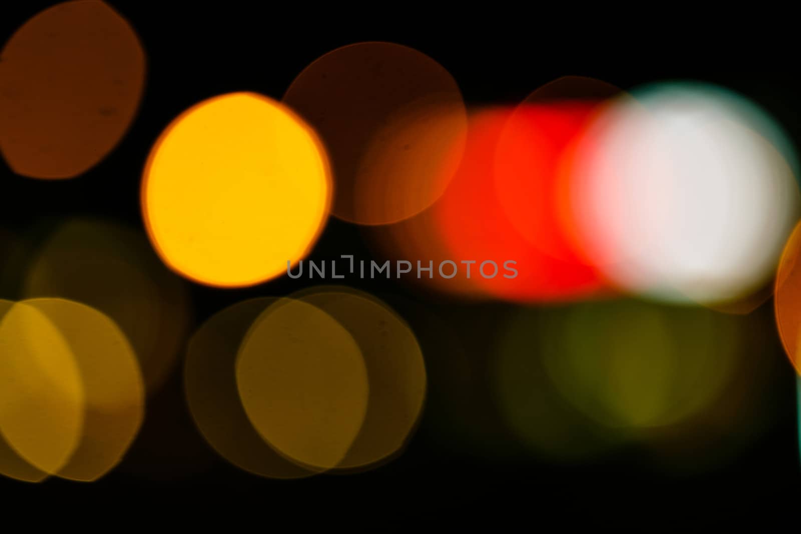 Abstract defocused lights of the night city bokeh background