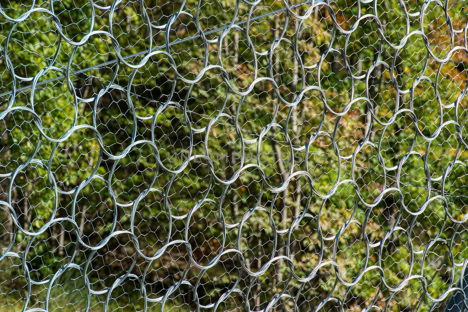 wire containment mesh repair constructed for the passage of vehicles by landslides