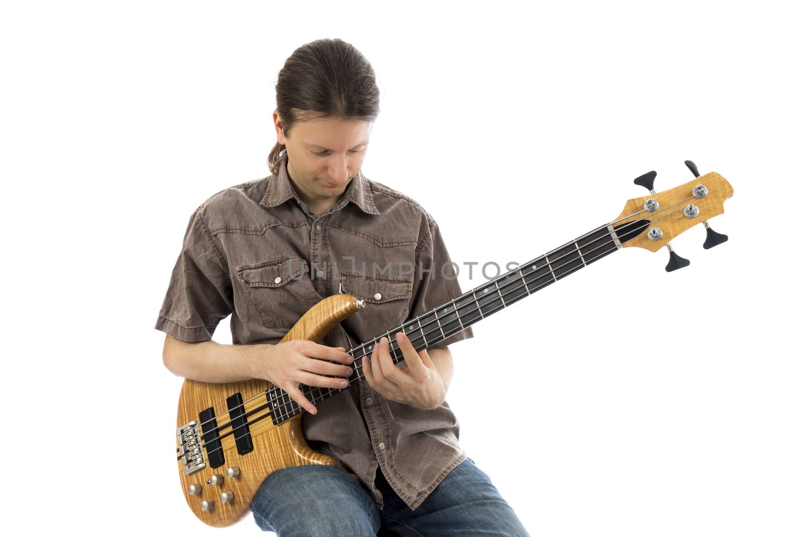 Bass guitarist with his bass guitar by snowwhite