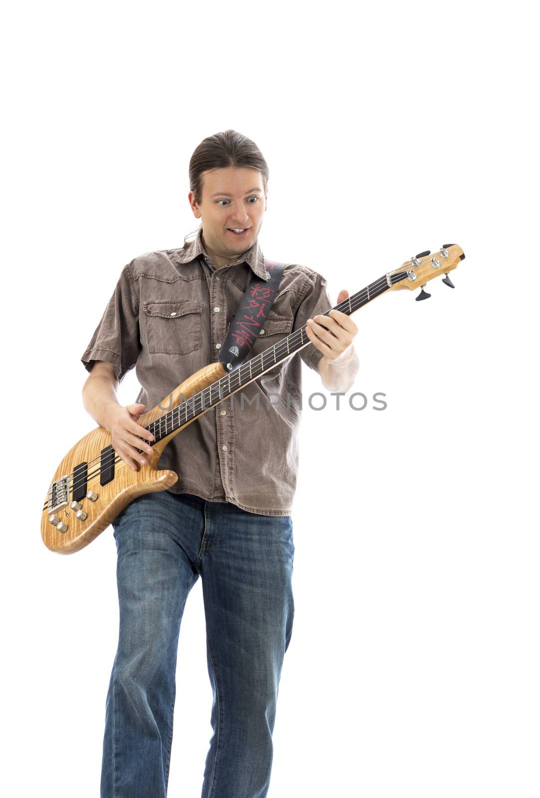 Bass guitarist with a funny look playing his bass guitar (Series with the same model available)