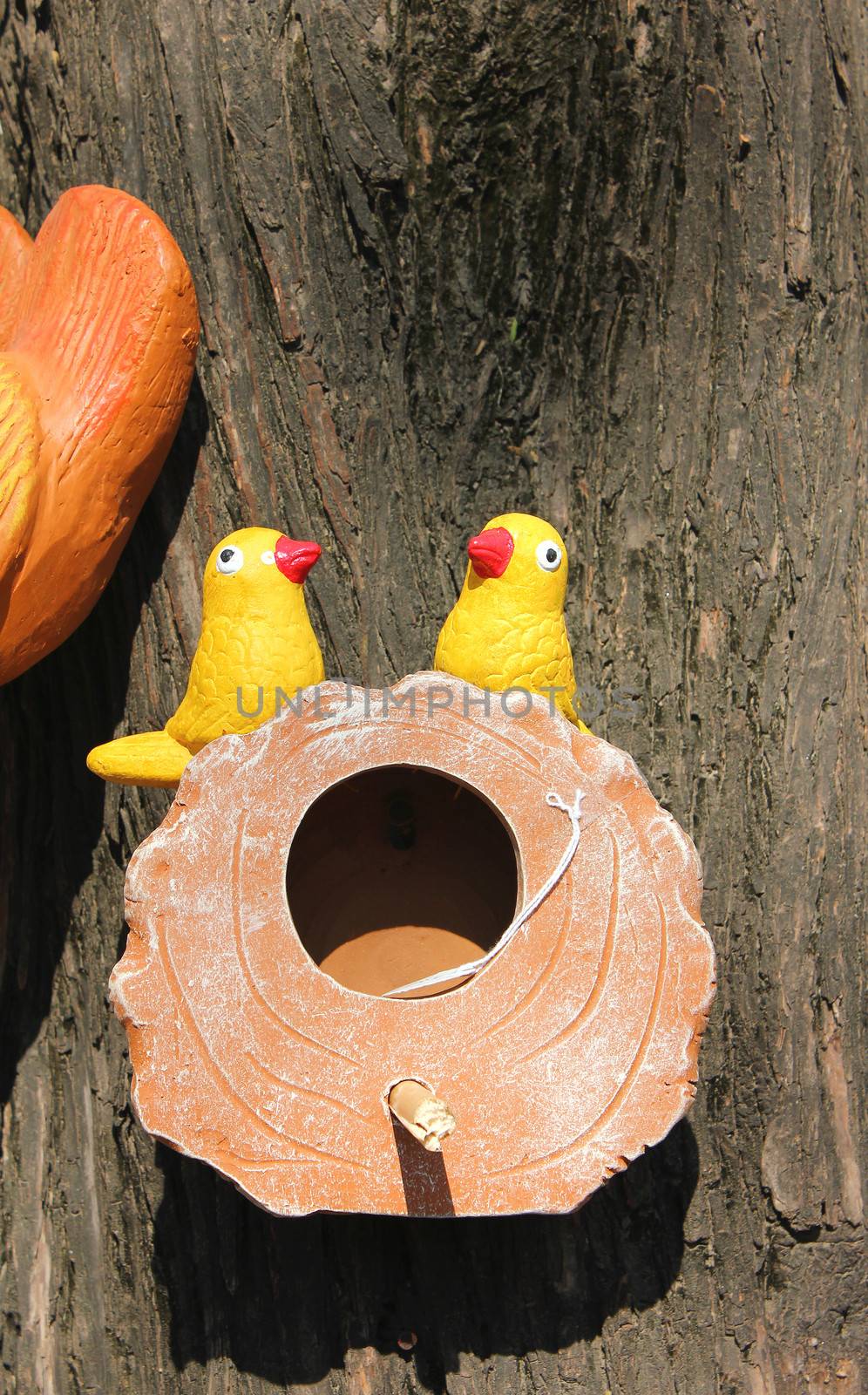 bird couple toy in their nest in surajkund mela