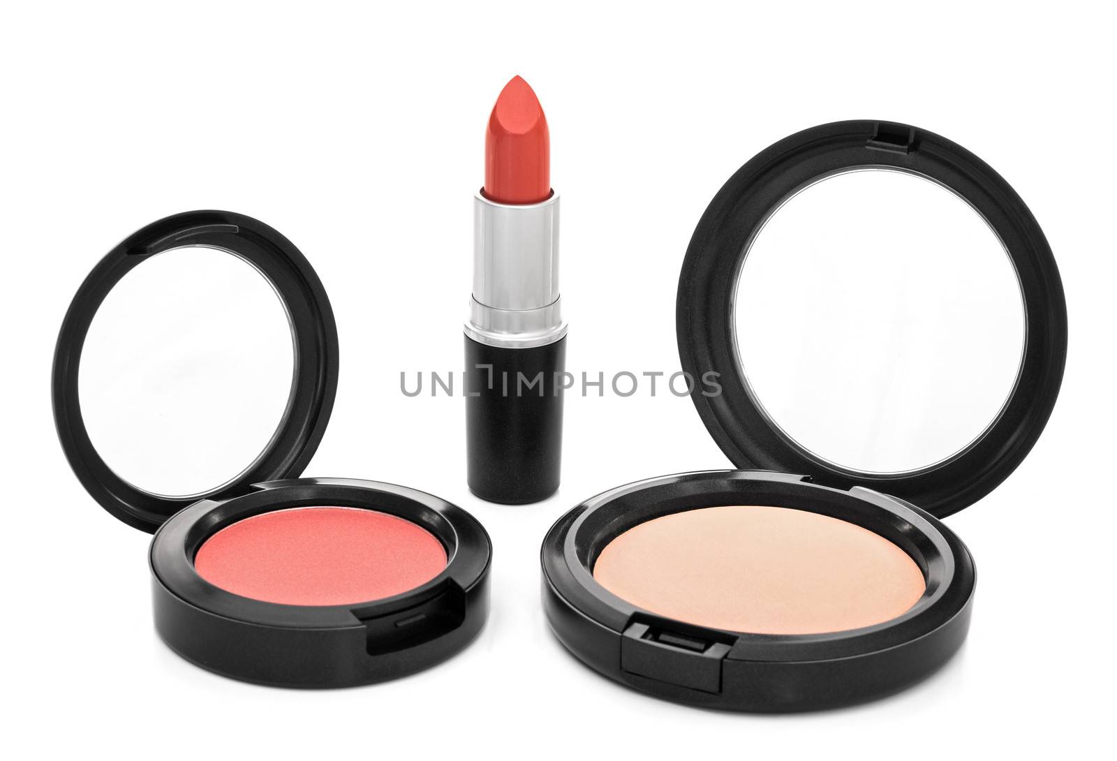 Makeup. Lipstick, blush and face powder, isolated on white background.