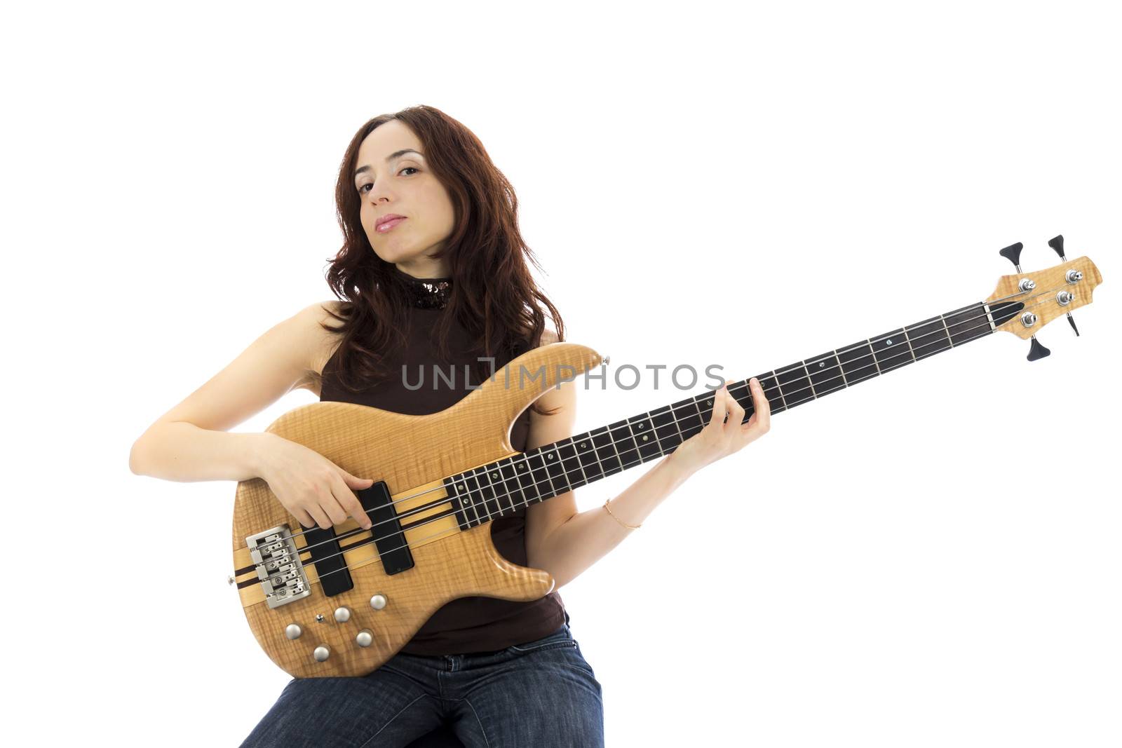 Young woman playing a bass guitar by snowwhite