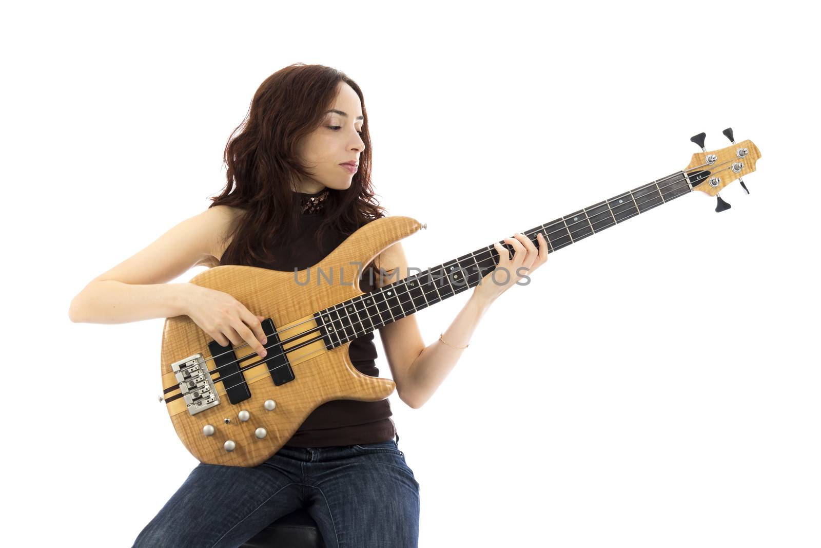 Young woman playing a bass guitar (Series with the same model available)