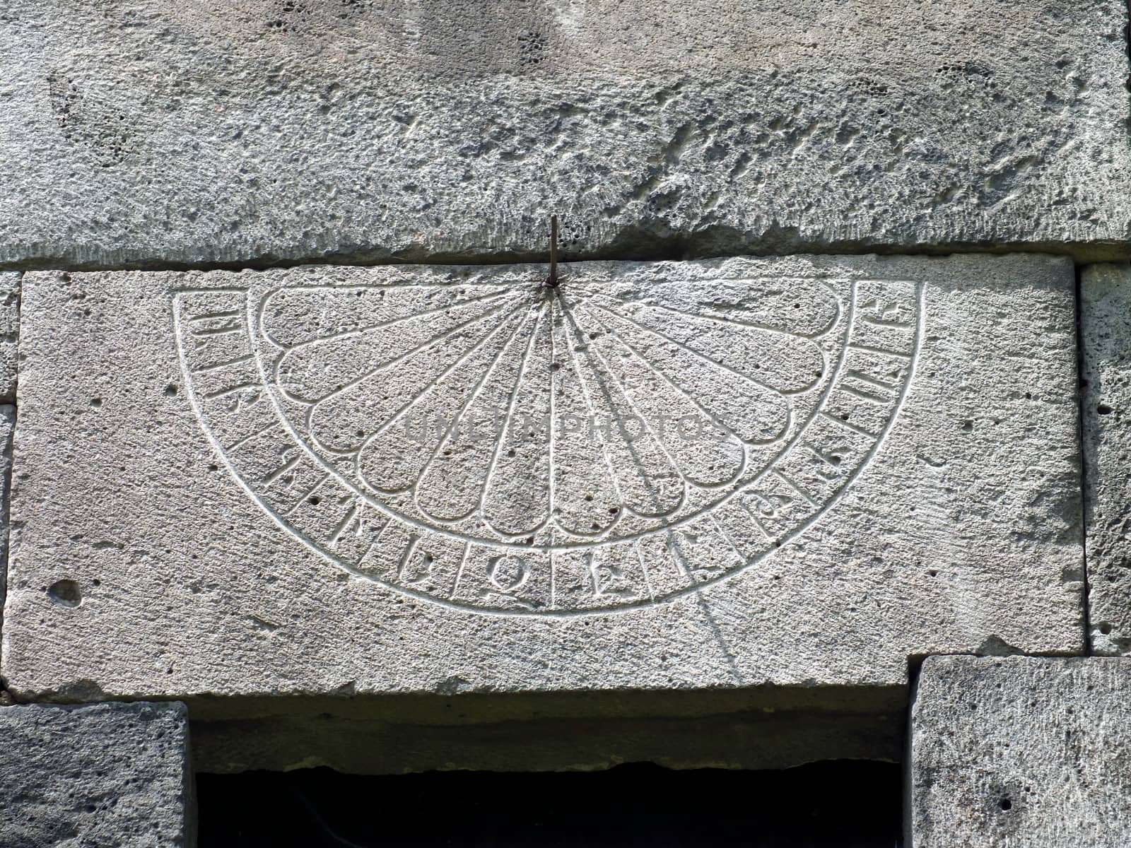 A sundial on a wall at Haghpat Monastery in Armenia