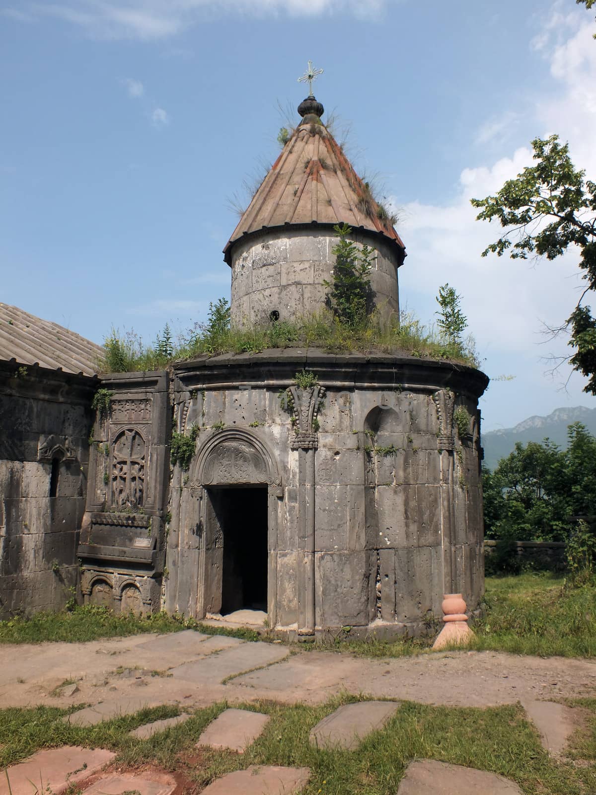 This late 10th century chapel  is a miniature dome structure is circular on the outside. The combination of arched niches, and delicately ornamented narrow windows create a sense of movement to an otherwise stoic structure.