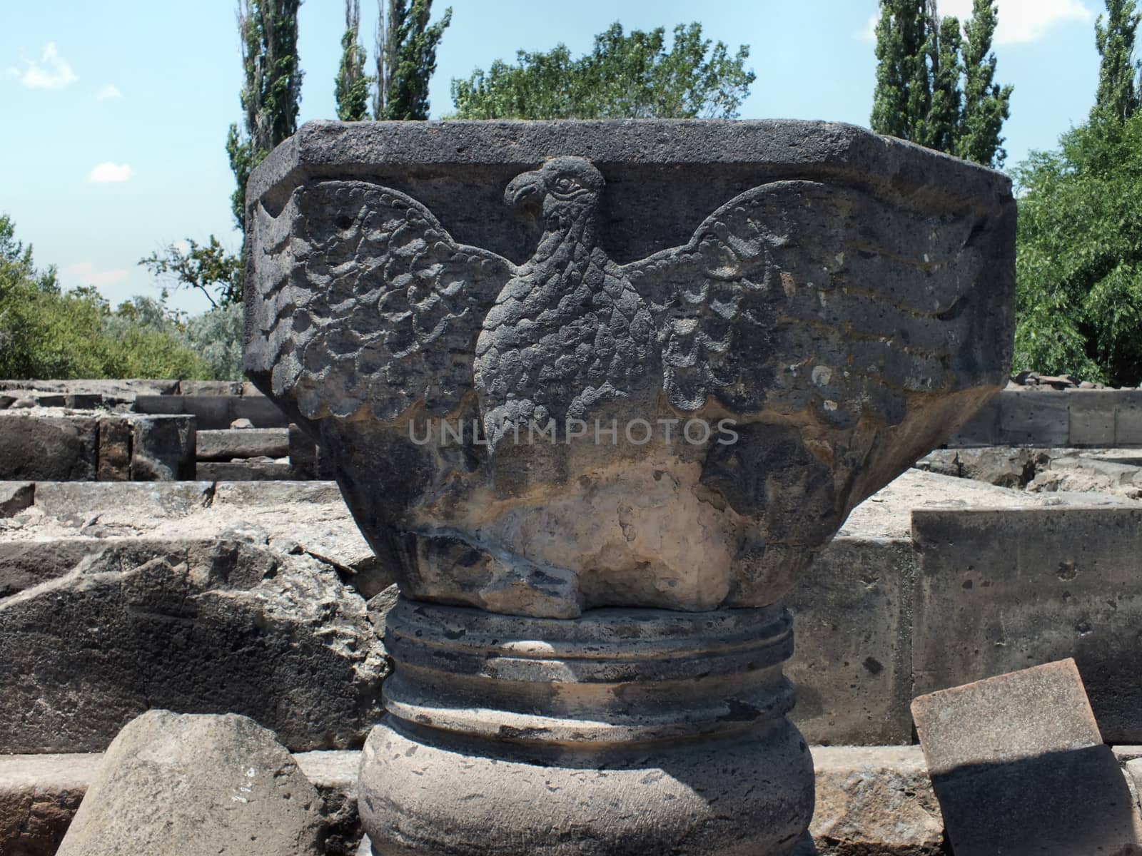 A close up of an eagle relief at the ruins of Zvartnots Cathedral in Armenia