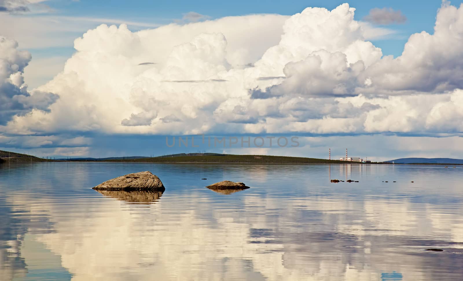 Beautiful river landscape with nuclear power station on the opposite bank