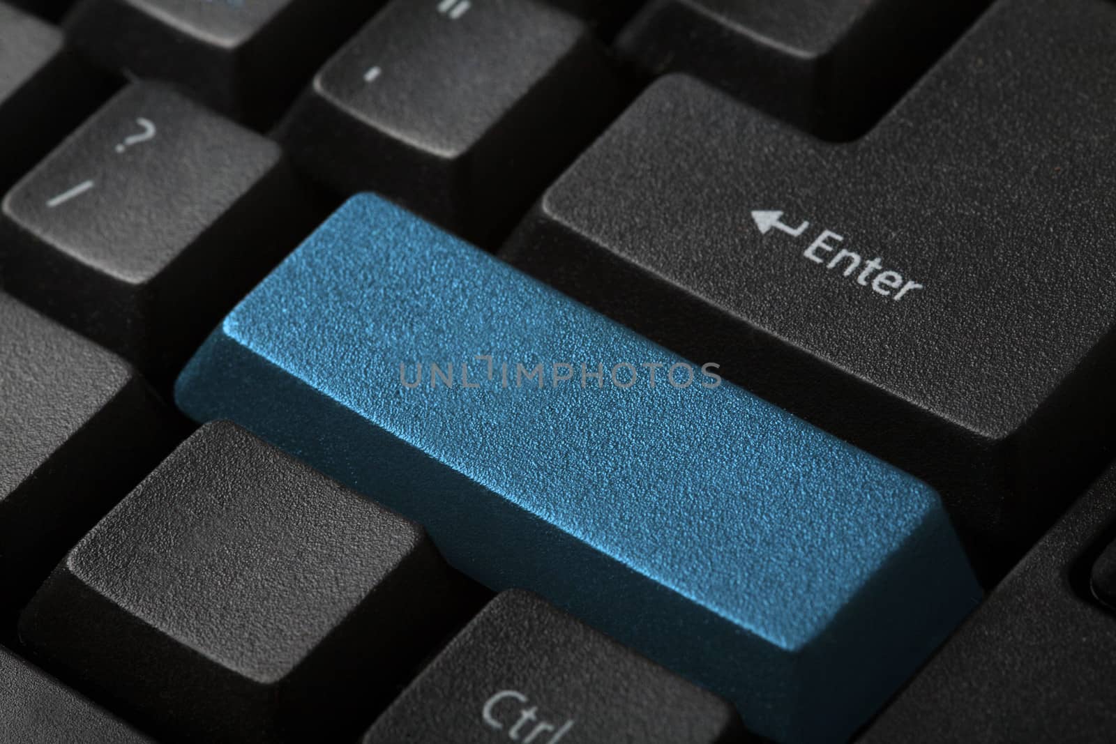 Blank blue button on the keyboard close-up