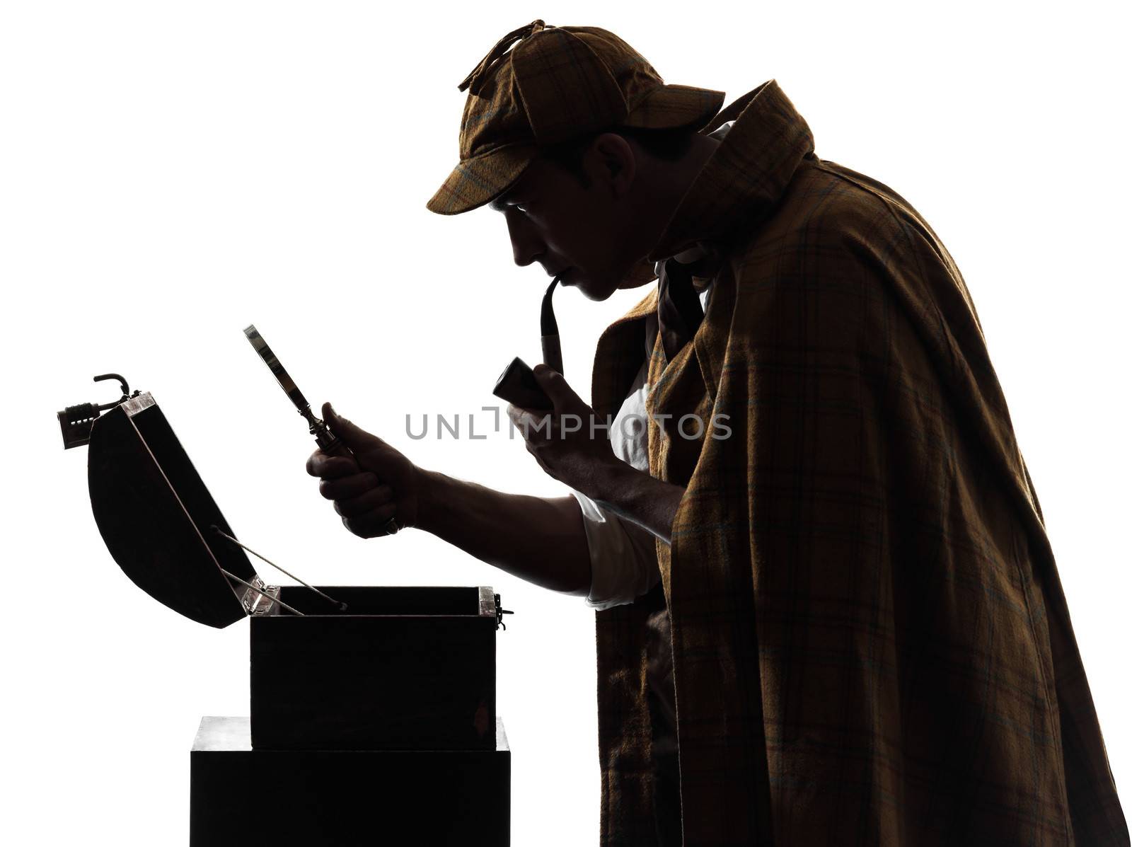 sherlock holmes looking at open safe silhouette in studio on white background