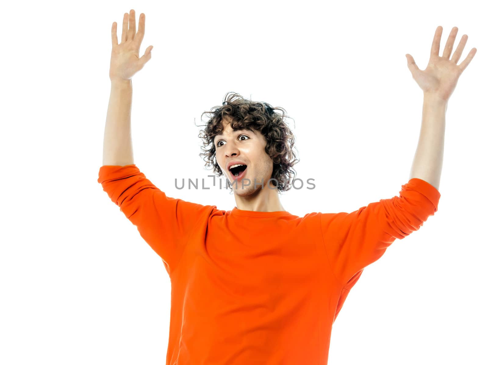 one young man caucasian gesturing surprised happy joy portrait in studio white background