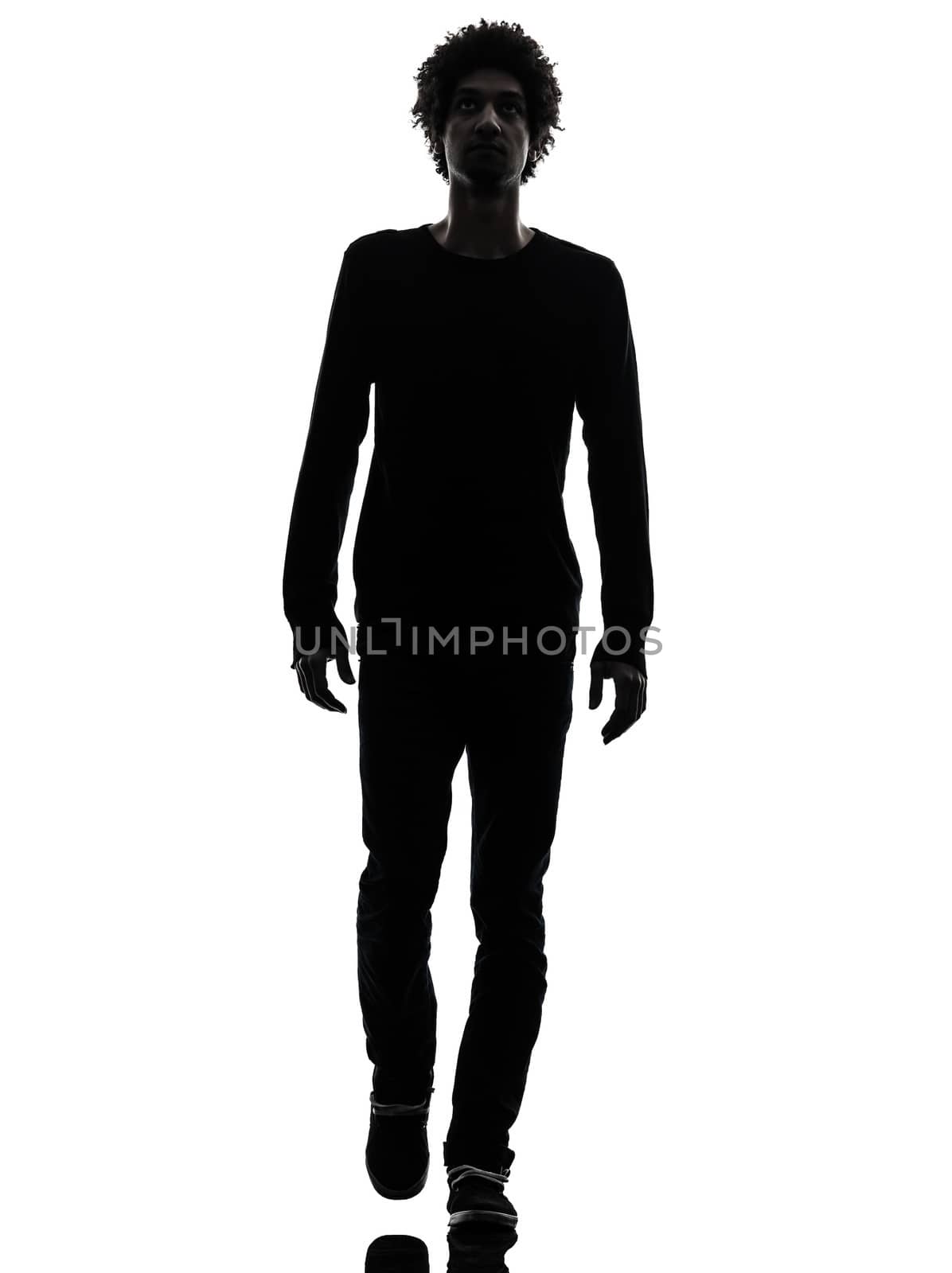 one african handsome young man walking in silhouette studio isolated on white background