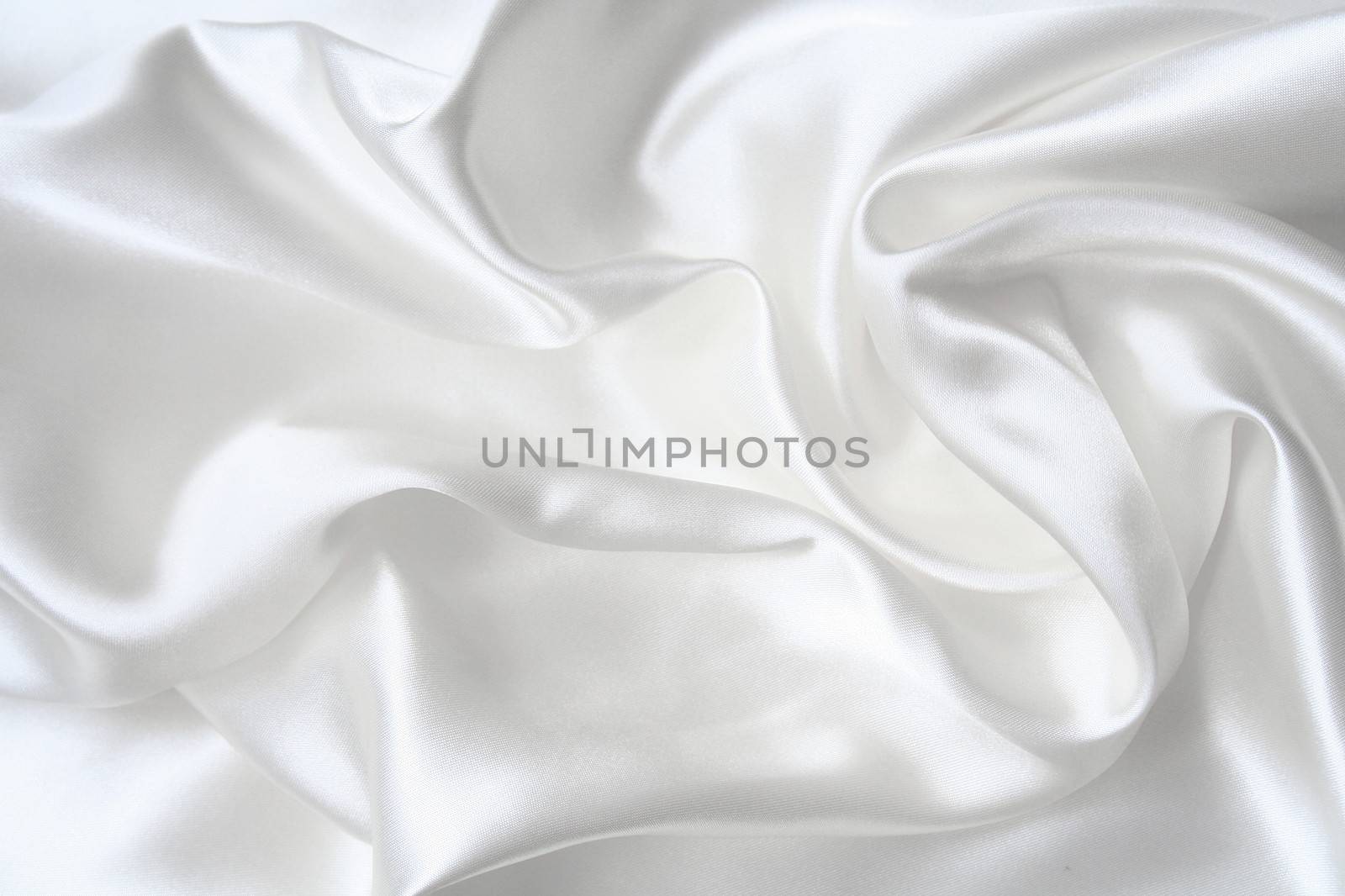 Smooth elegant white silk can use as wedding background 