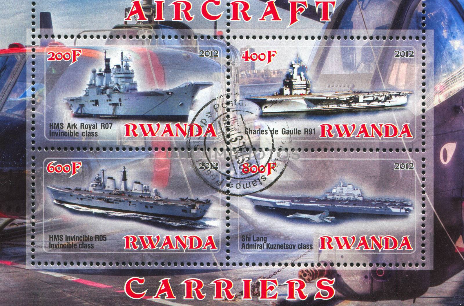RWANDA - CIRCA 2012: stamp printed by Rwanda, shows aircraft carrier, circa 2012