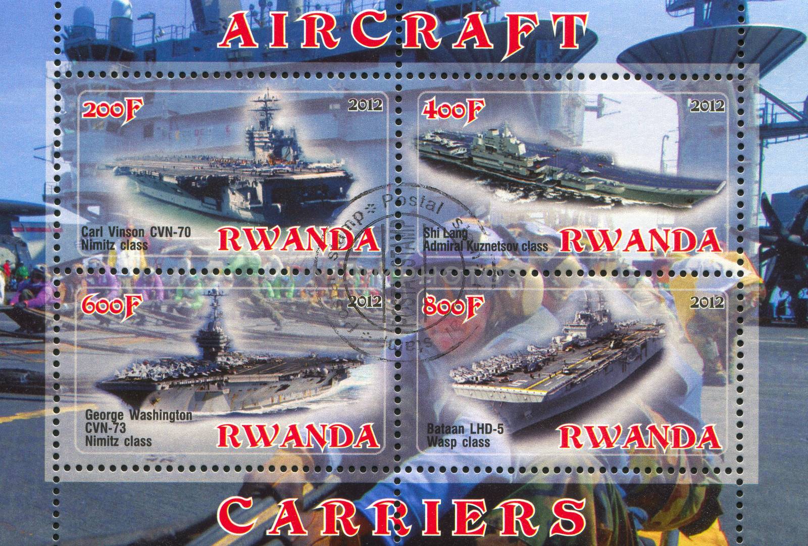 RWANDA - CIRCA 2012: stamp printed by Rwanda, shows aircraft carrier, circa 2012