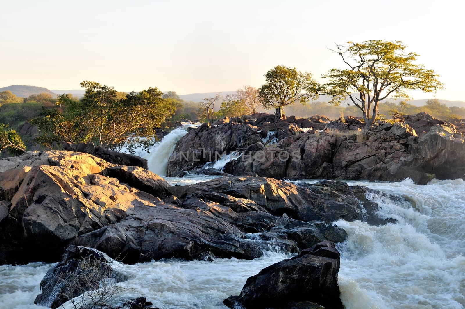 Ruacana Falls on the border of Namibia and Angola at sunrise.