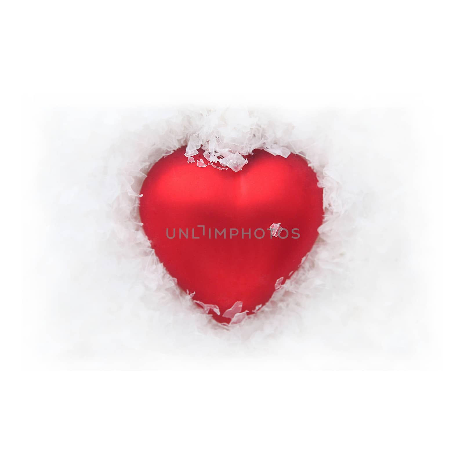  Red heart in the snow - white background 