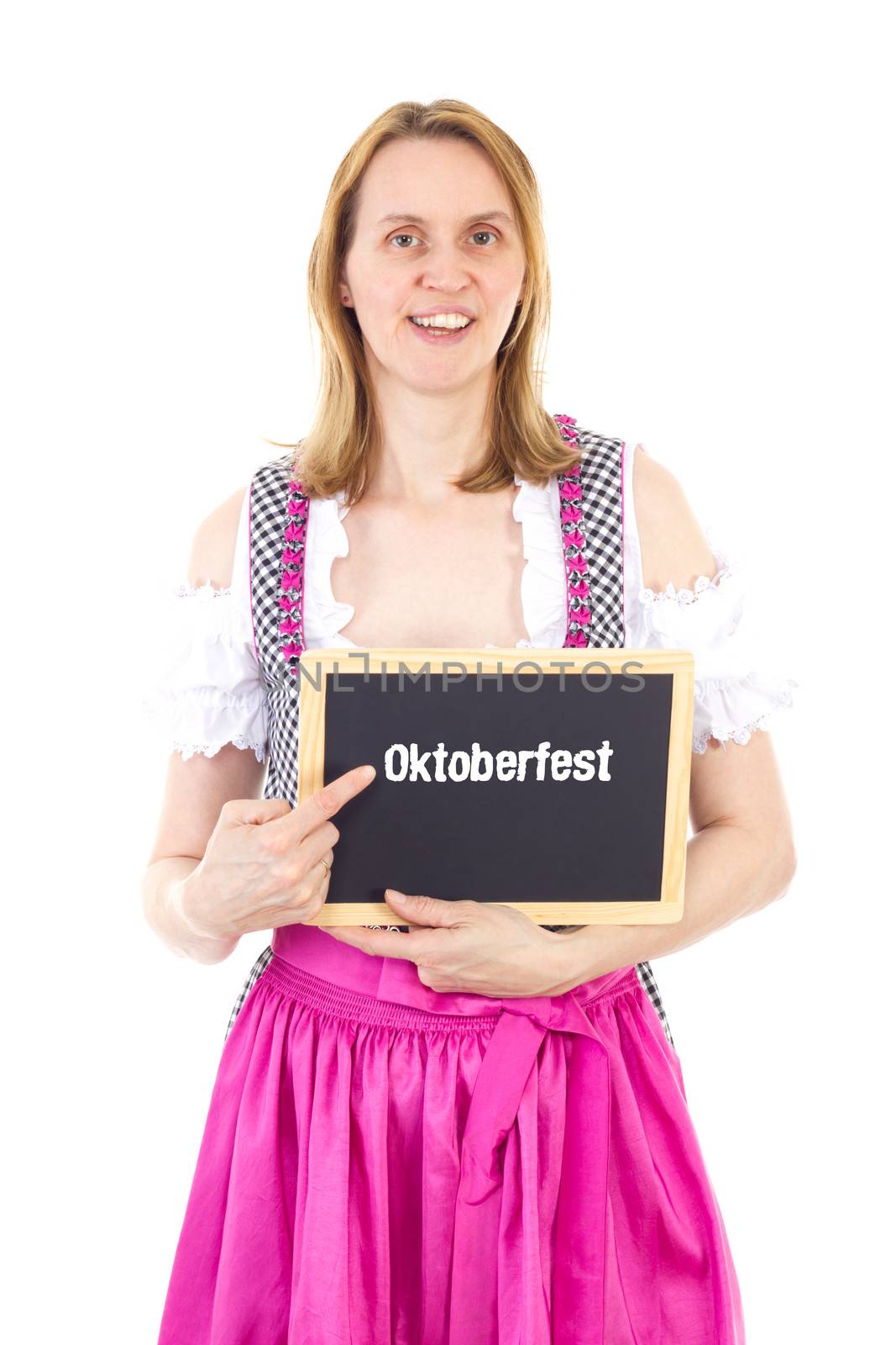 Woman in dirndl pointing blackboard : Oktoberfest by gwolters
