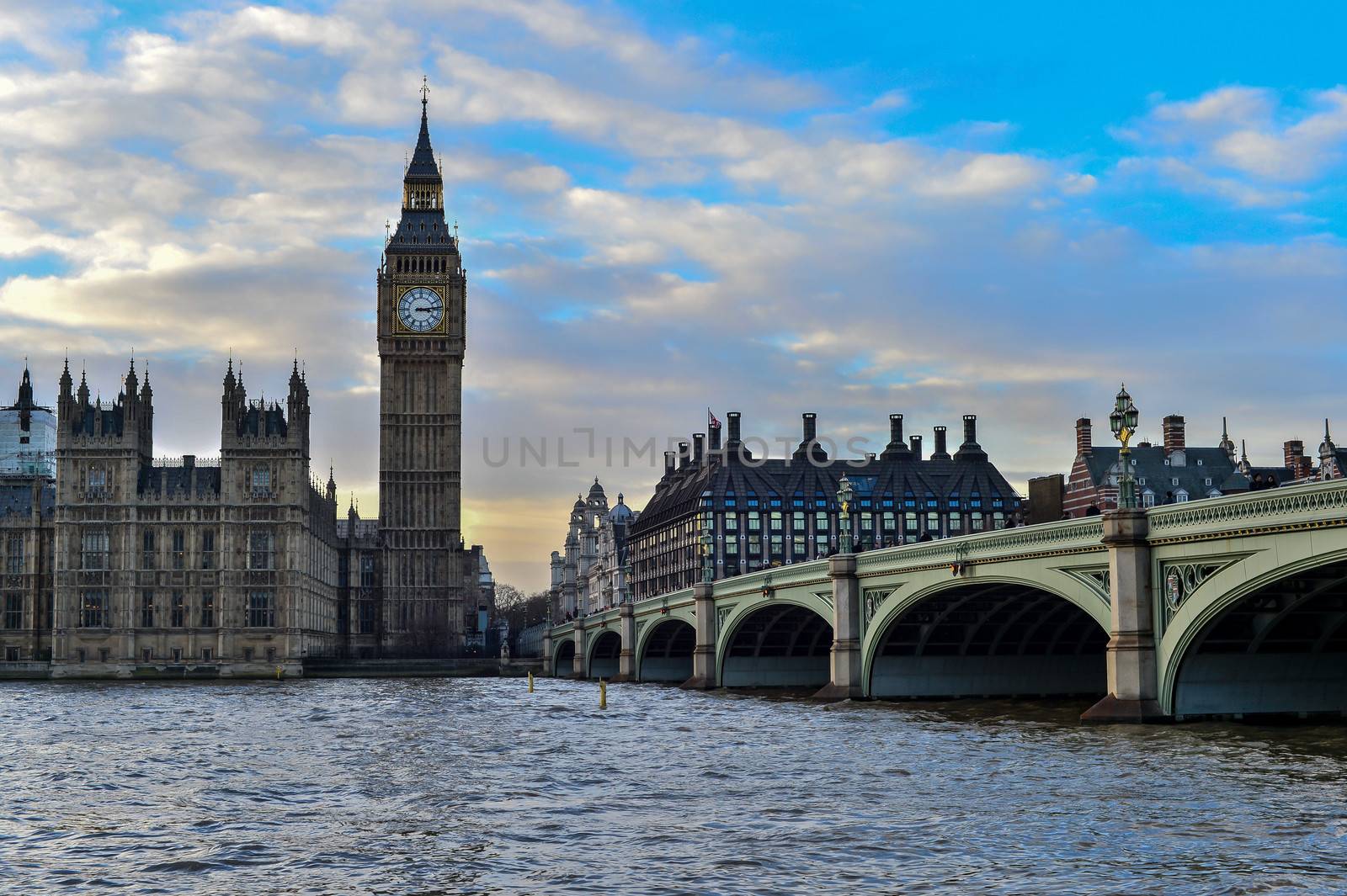 The Big Ben and Westminster Bridge in London by stockyimages