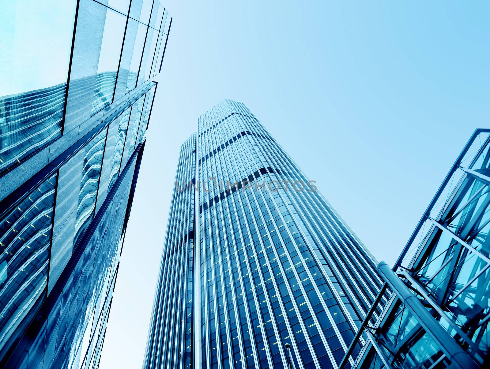 Low angle shot of modern glass city buildings