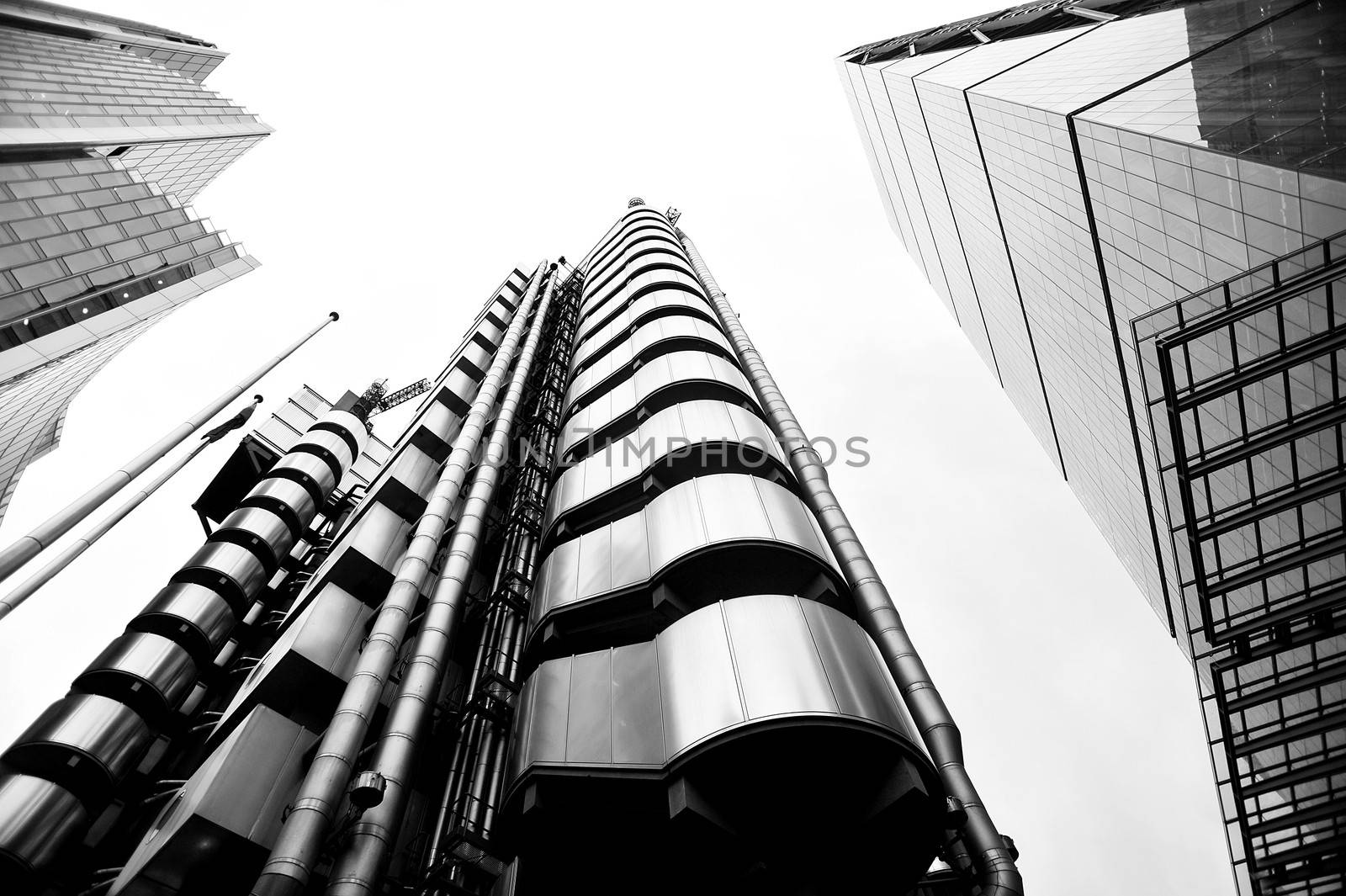 Low angle shot of modern glass city buildings by stockyimages