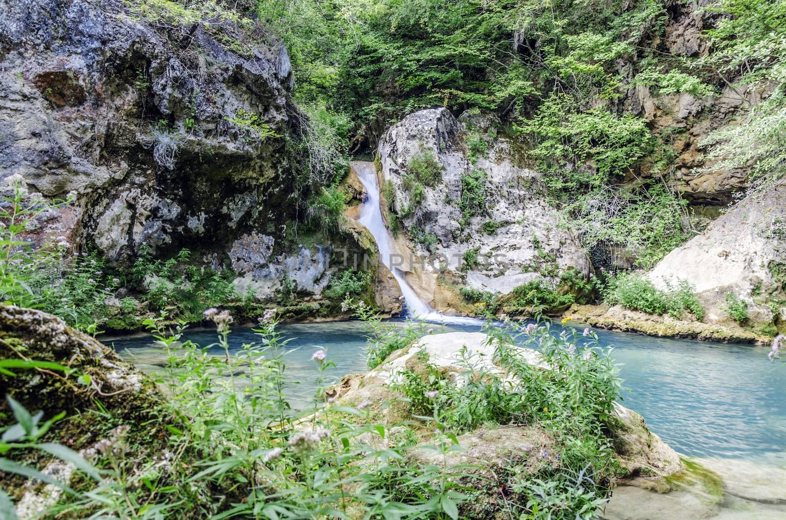 Beautiful waterfall in the river deep in to the Navarra's mountain in Spain.