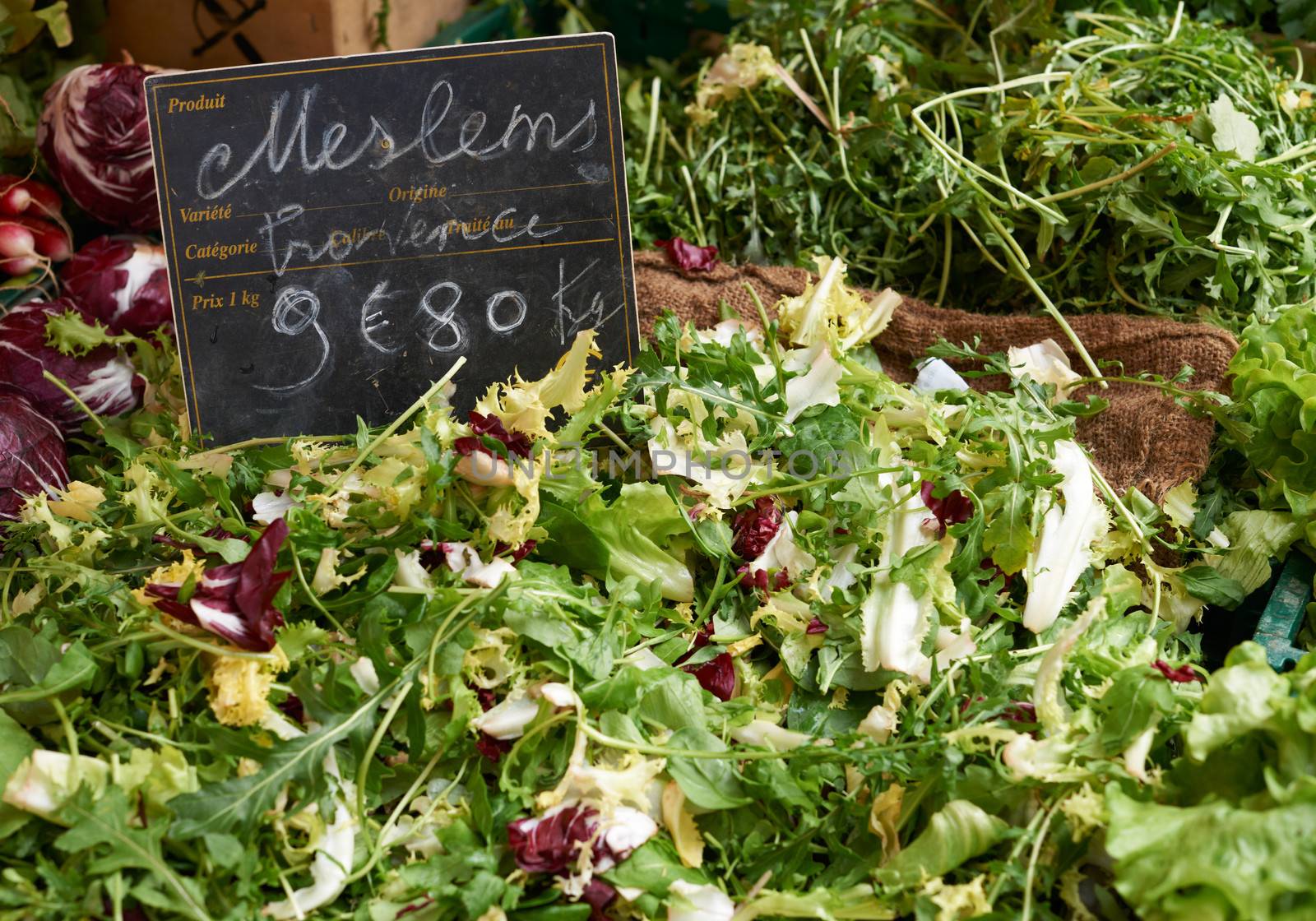 Fresh green salad for sale on Provence market of Marseille, South France