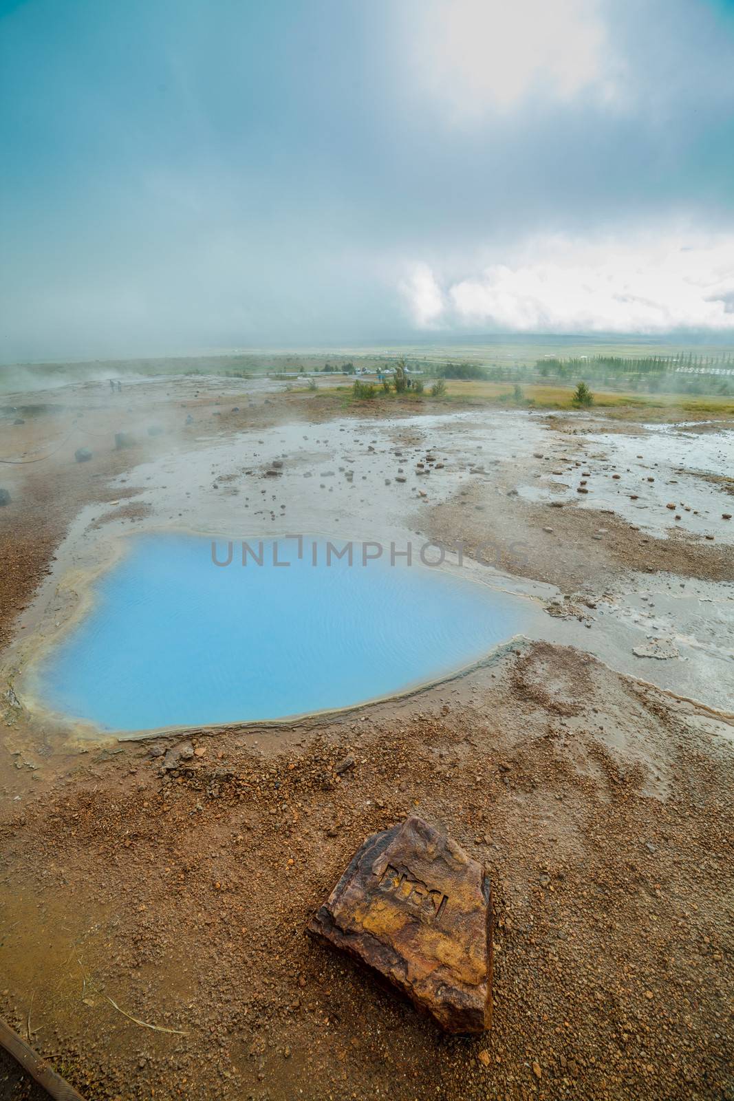 Geothermal activity with hot springs landscape, Iceland. Vertical view