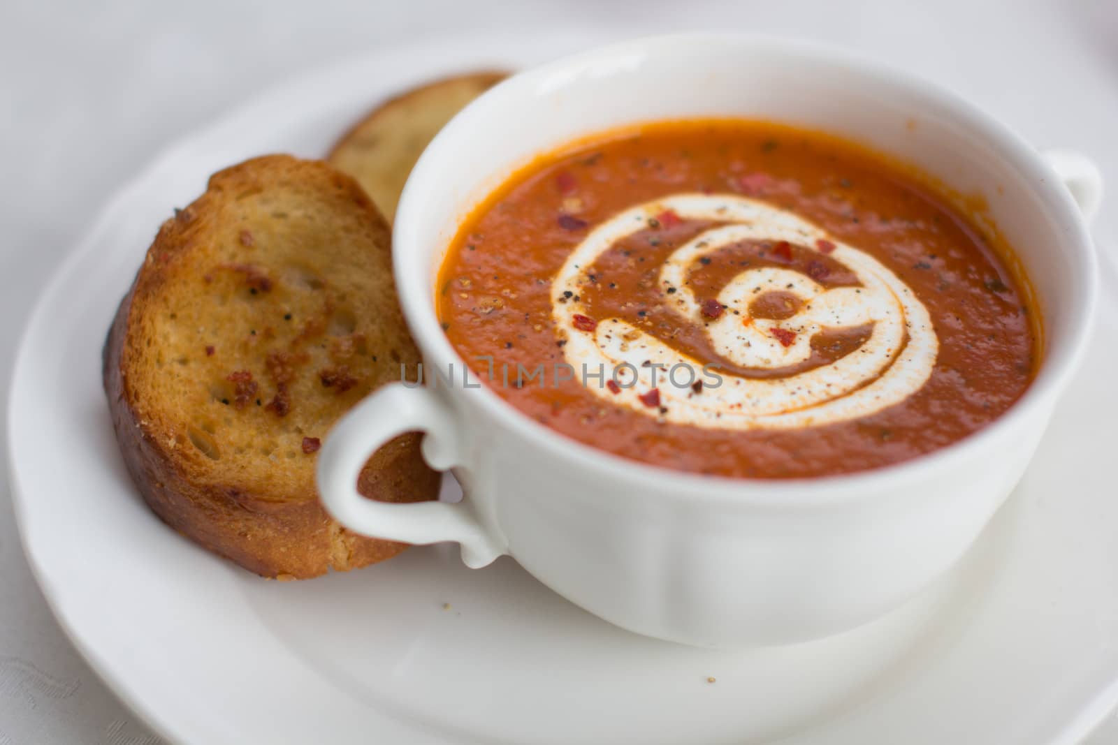 Soup in a cup and baked bread