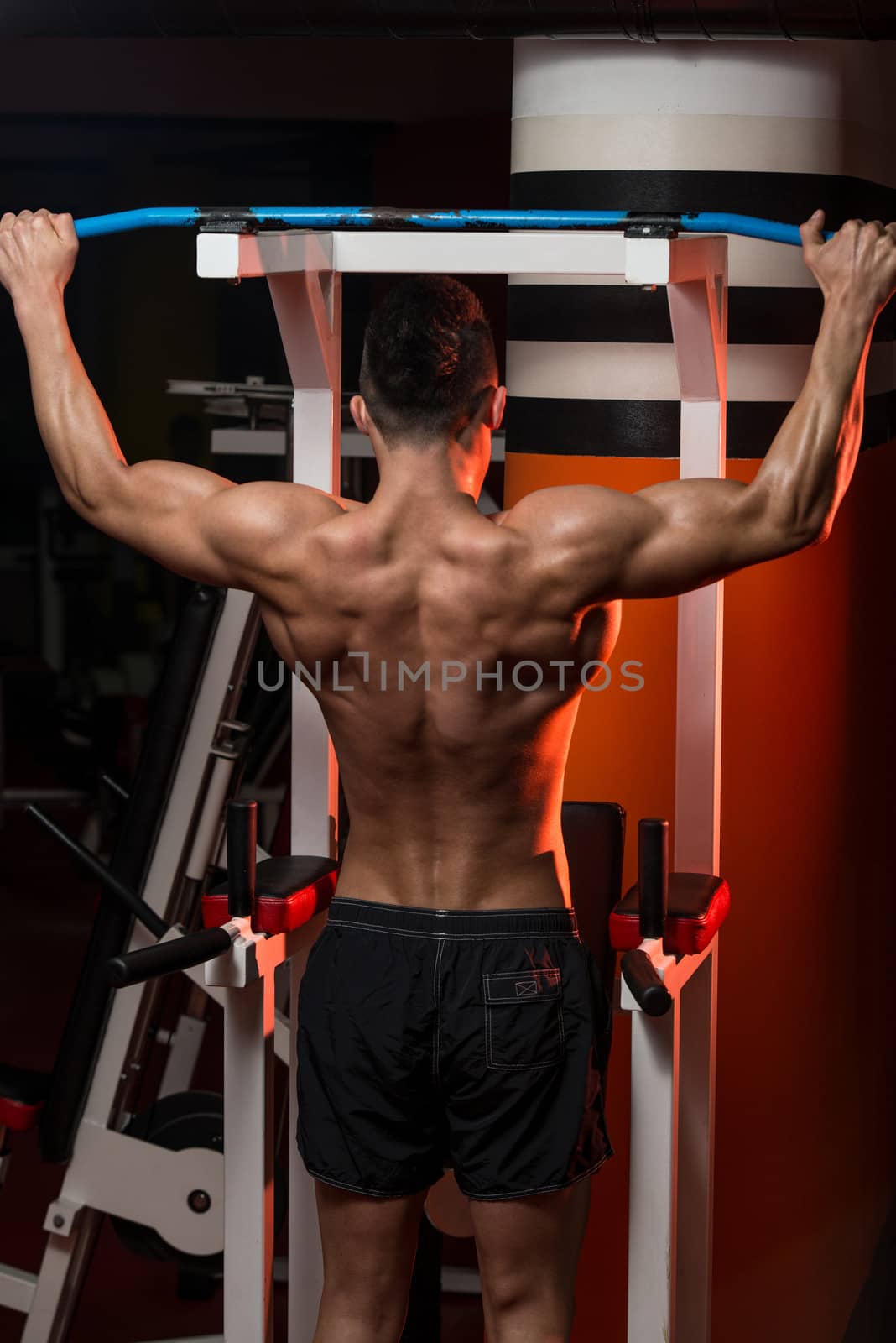 Man Working Out In A Gym by JalePhoto