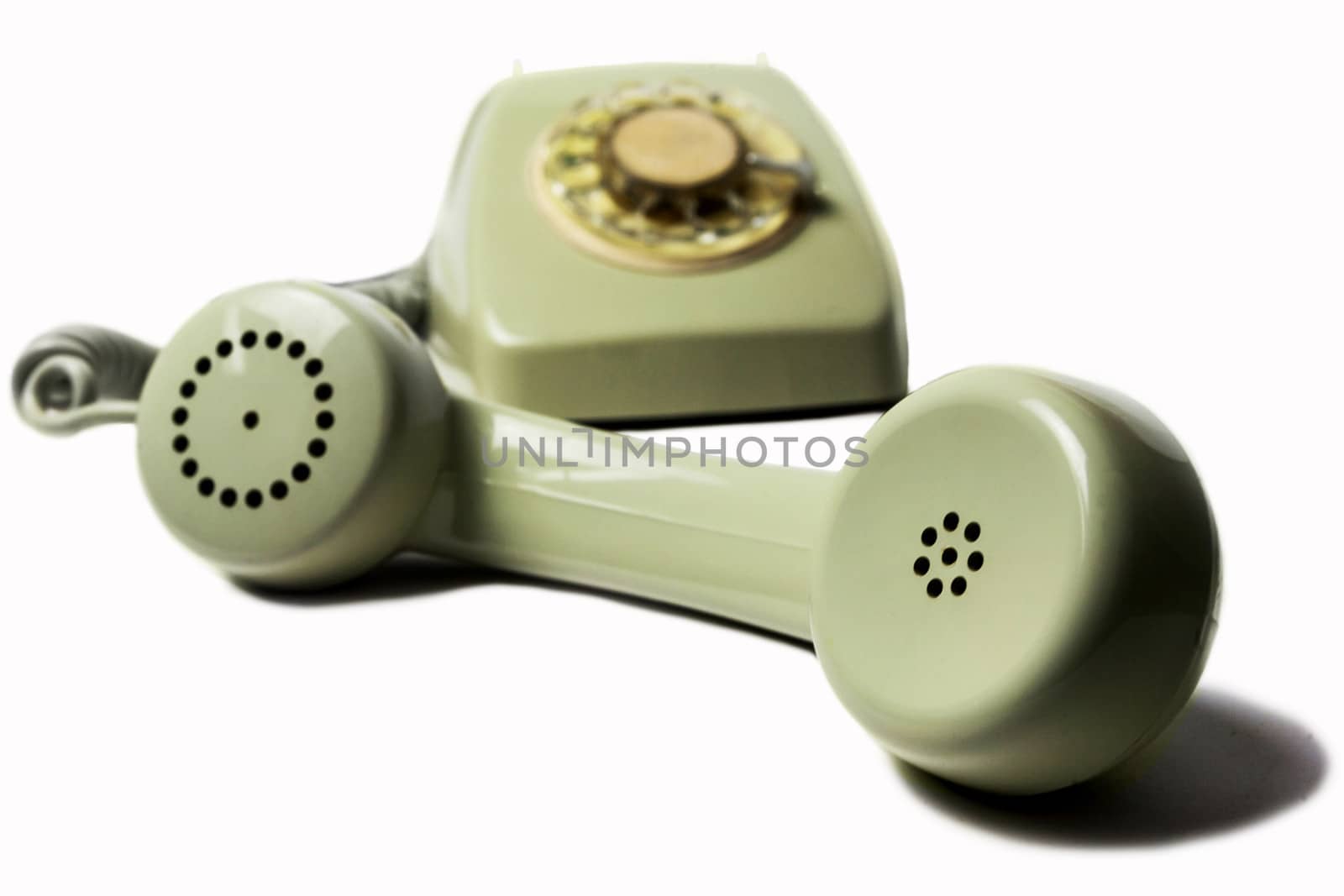 Vintage telephone receiver isolated on white background 