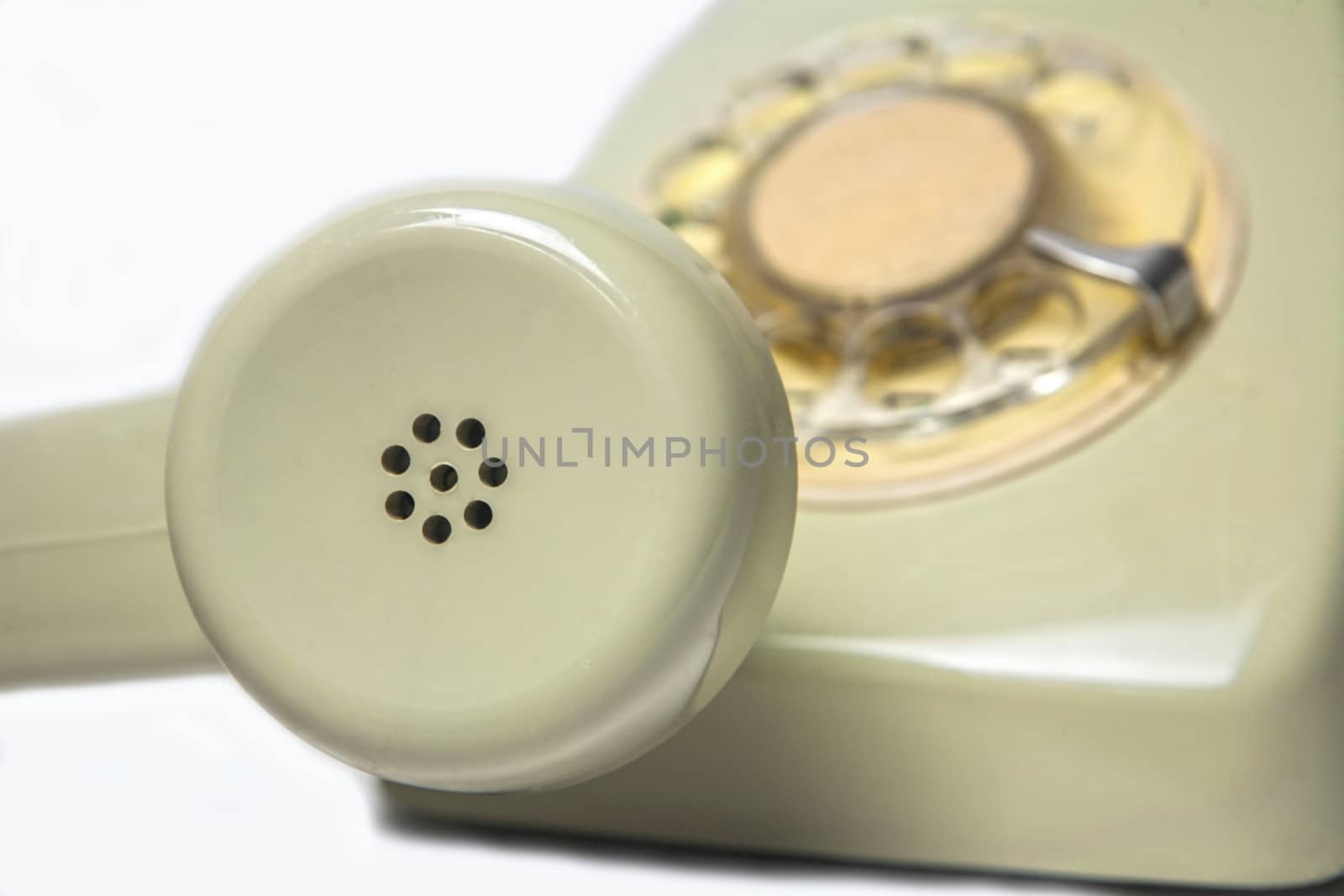 Vintage telephone receiver isolated on white background 