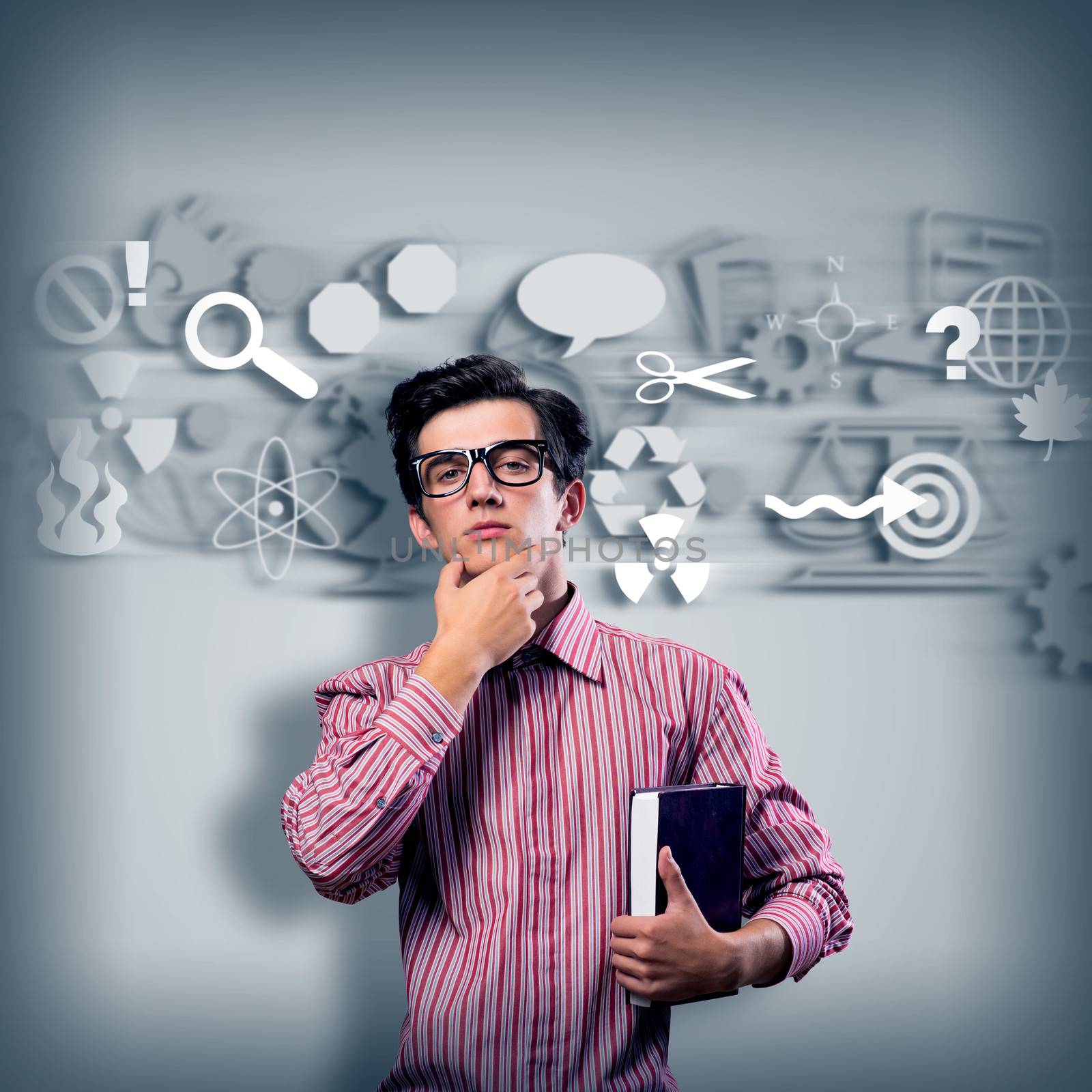 young man scientist in glasses thinking. next to it various painted symbols