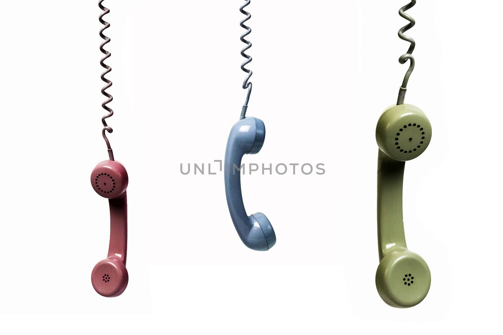 Three phones hanging from several colors isolated on a white background