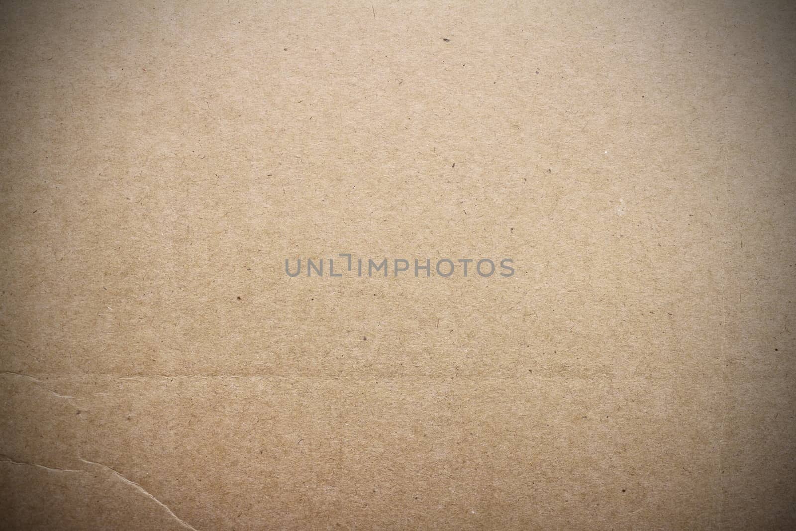 detail of cardboard texture with added vignette