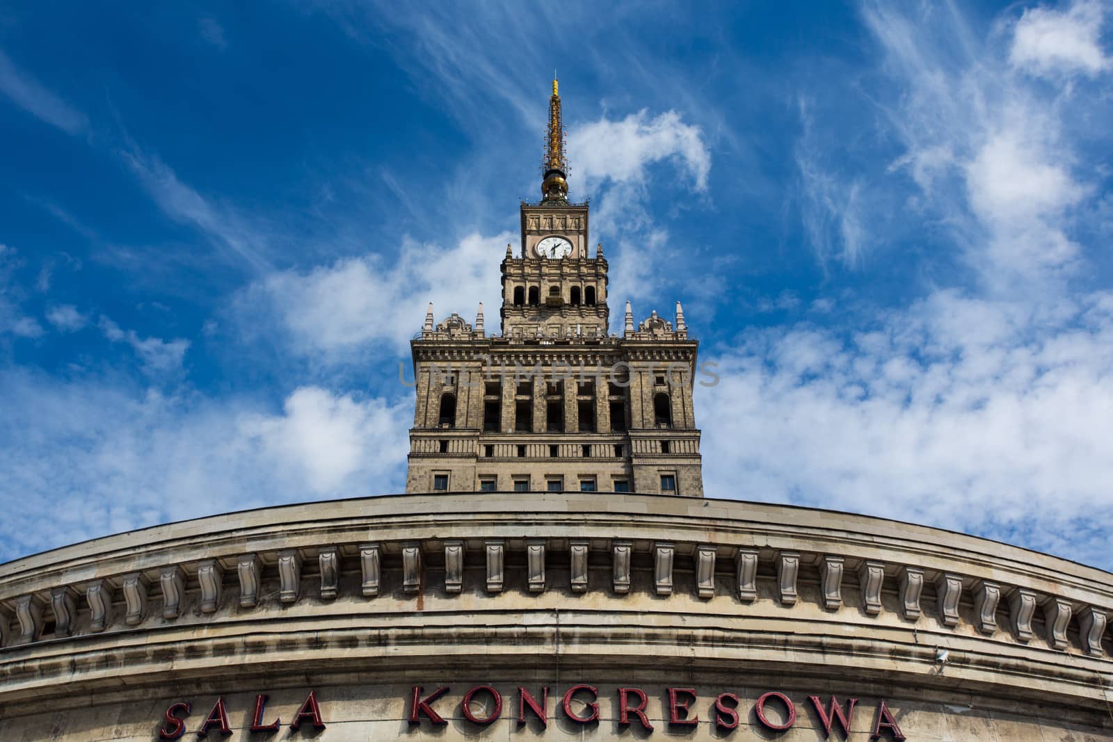 Palace of Culture and Science in Warsaw, Poland. The symbol of communism. Blue clear sky in the background