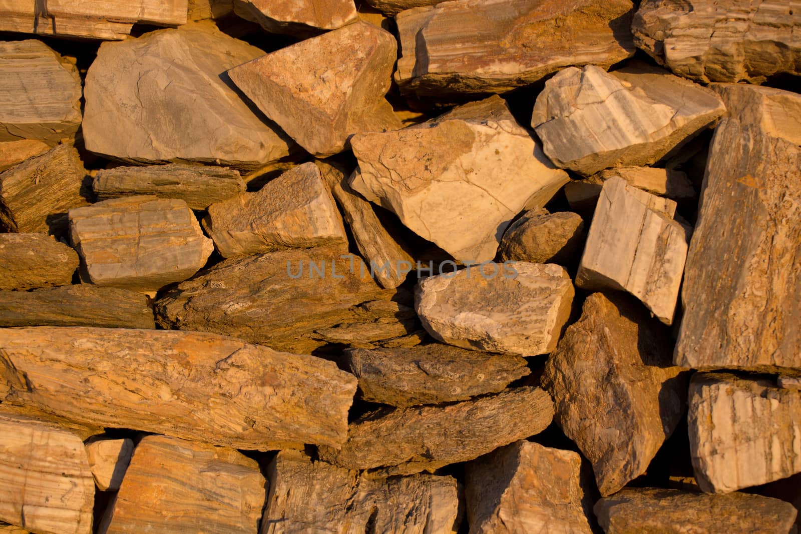 Close-up of a pile of Antique stones  by watchtheworld