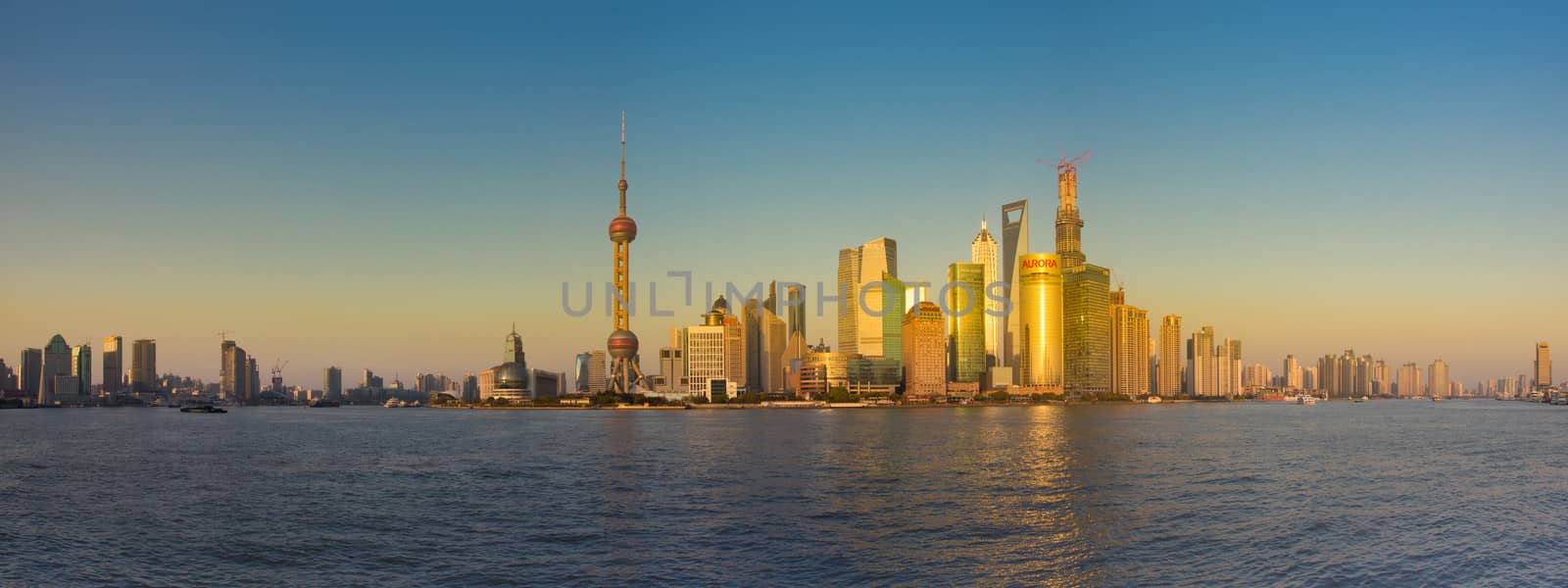 Shanghai skyline with reflection and Pudong by watchtheworld